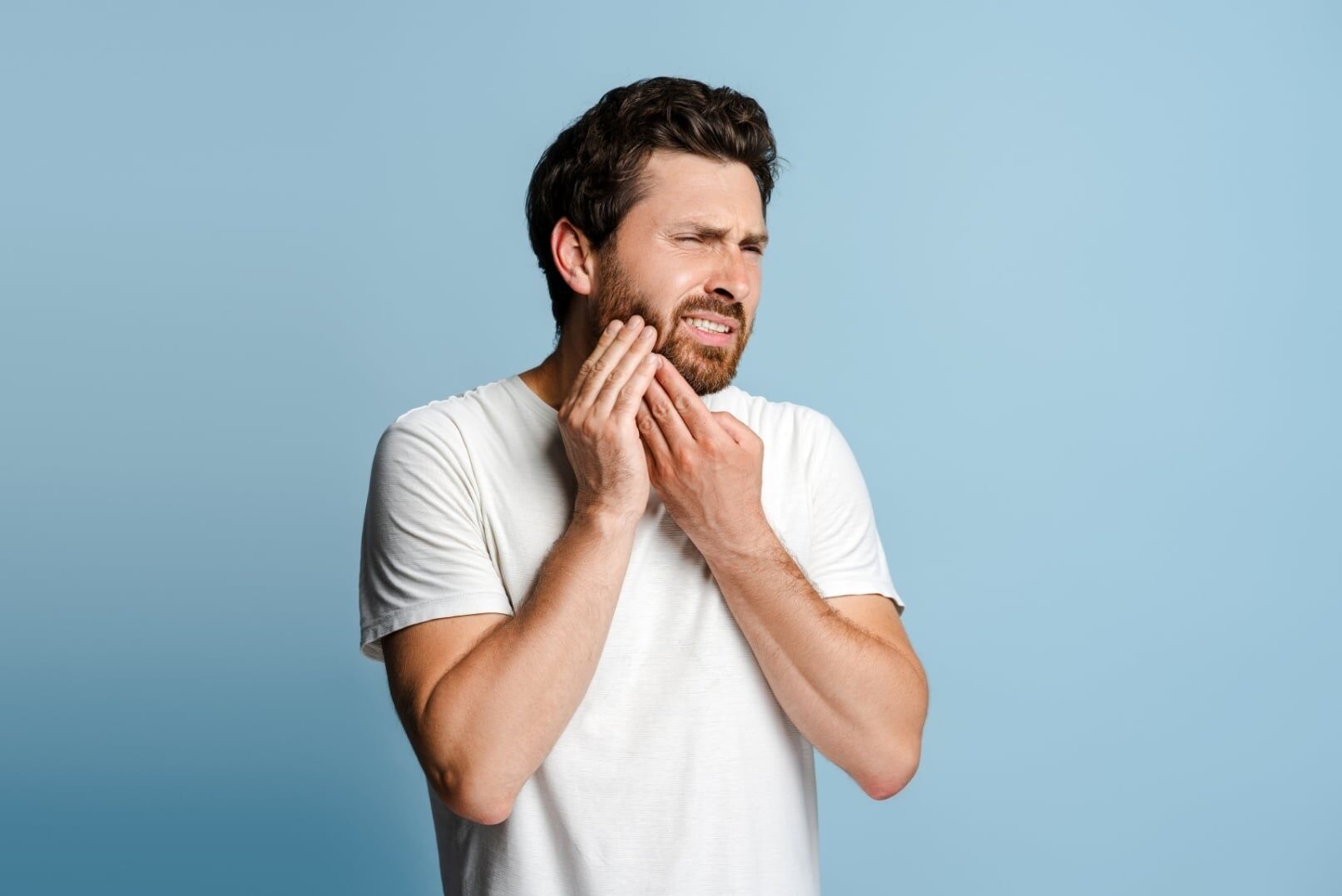 Illuminated wall-mounted signage for Coco Dental, featuring a minimalist circular "CD" monogram logo and clean sans-serif typography in a modern clinical setting.